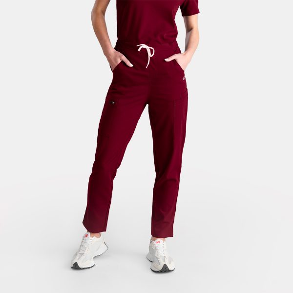 Close Up Photo of Female Healthcare Professional in Vibrant Sangria Red Straight Leg Scrubs Pants