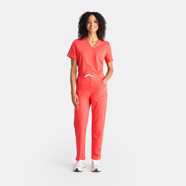 Full Body View of the Modern Scrub Pants in Watermelon Pink, Highlighting Deep Pockets for Added Functionality and Convenience.