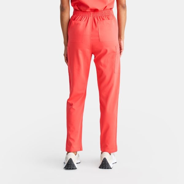 Back View of the Modern Scrub Pants in Watermelon Pink, Highlighting Deep Pockets for Added Functionality and Convenience.