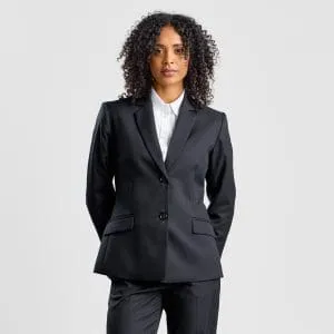 Frontal View of a Woman with Curly Hair in a Black Classic 2-button Blazer, with a White Shirt Underneath.