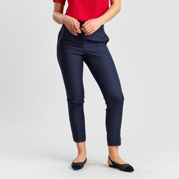 Front View of Women's Slim Style Chino Pant in French Navy, Featuring a Snug Waist and Slight Stretch, Styled with a Tucked-in Red Blouse for Professional Attire.