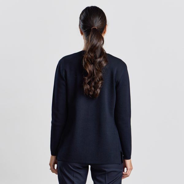 Rear View of a Woman Wearing a French Navy Milano Knit Button Front Cardigan, Showing the Fit and Length at the Back.