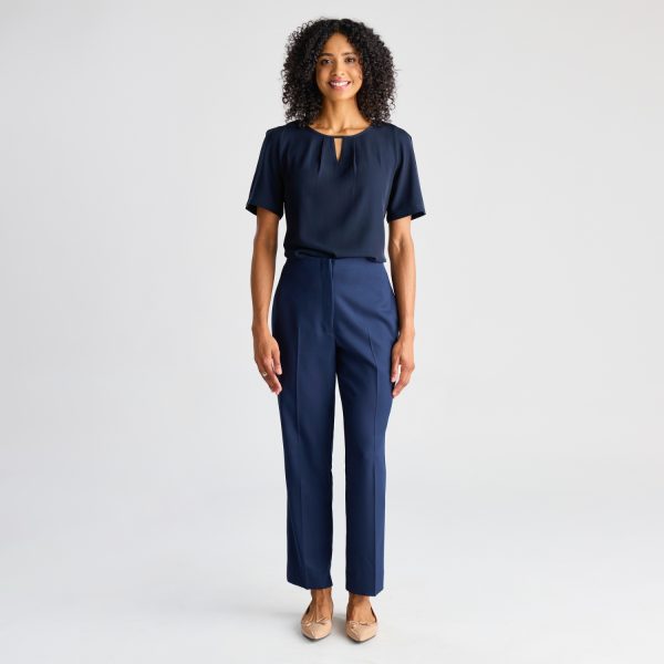 Full Body View of a Model in a Navy Keyhole Blouse with Short Sleeves, and Matching Trousers, Standing Confidently.