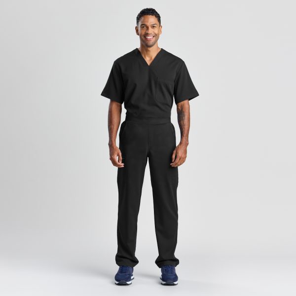 Full-body Portrait of a Male Model in Men's Modern Scrub Pant in Black with a Matching V-neck Scrub Top, Presenting a Professional and Sleek Uniform for Healthcare Workers.