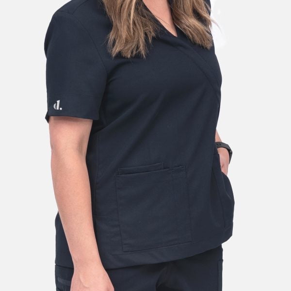 Close Up Women Wearing Twilight Navy Crossover Shirt, a Vibrant and Fashionable Choice