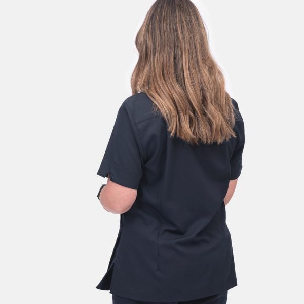 Back View Women Wearing Twilight Navy Crossover Shirt, a Vibrant and Fashionable Choice