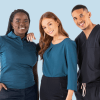 the Banner for the Article '3 Mistakes to Avoid when Choosing a Uniform Supplier' Depicts Three Young, Professional Looking Models Wearing Stylish, High-quality Blue and Navy Uniforms Manufactured by Designs to You. They're Smiling Confidently at the Camera and Standing in Front of a a Light Blue Background.