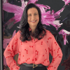 the Banner for the Article 'meet 'the Uniform Lady'' Features an Image of Designs to You's Ceo and Creative Director, Maria Grossi Smiling Confidently at the Camera. the Image Taken As Part of Maria's Feature in Anz Bank's Women in Leadership Series.