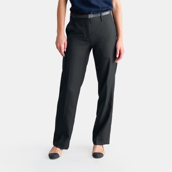 a Woman in Stylish Work Clothes Wearing Relaxed Black Straight Leg Pants, Navy Short Sleeve Shirt and a Simple Leather Belt by Designs to You.
