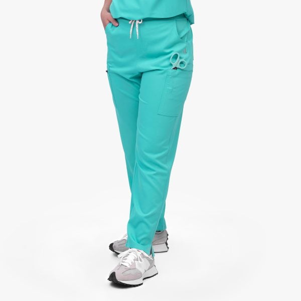 Modern Scrub Pants in Cool Mint Blue, Highlighting Deep Pockets for Added Functionality and Convenience.
