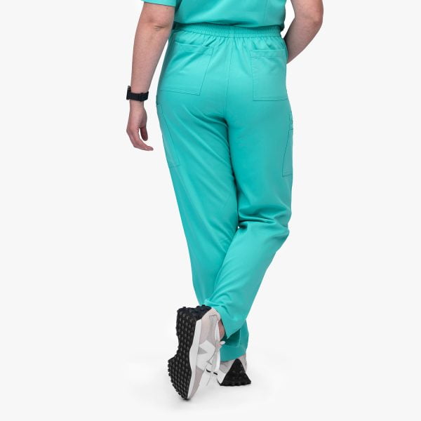 Back of the Modern Scrub Pants in Cool Mint Blue, Highlighting Deep Pockets for Added Functionality and Convenience.