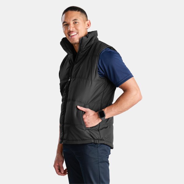 Unisex Puffer Vest in Black, Viewed from the Side with Male Model