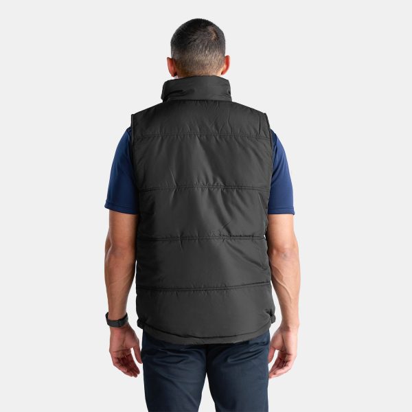 Unisex Puffer Vest in Black, Viewed from the Back with Male Model