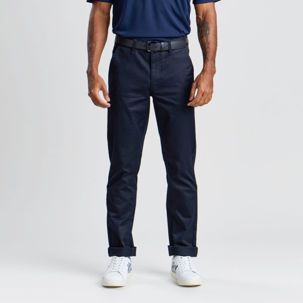 Front View of Men's Slim Style Chino Pant in French Navy, Showing the Pants' Clean Lines and Modern Fit, Topped with a Navy Polo Shirt for a Smart Casual Look.
