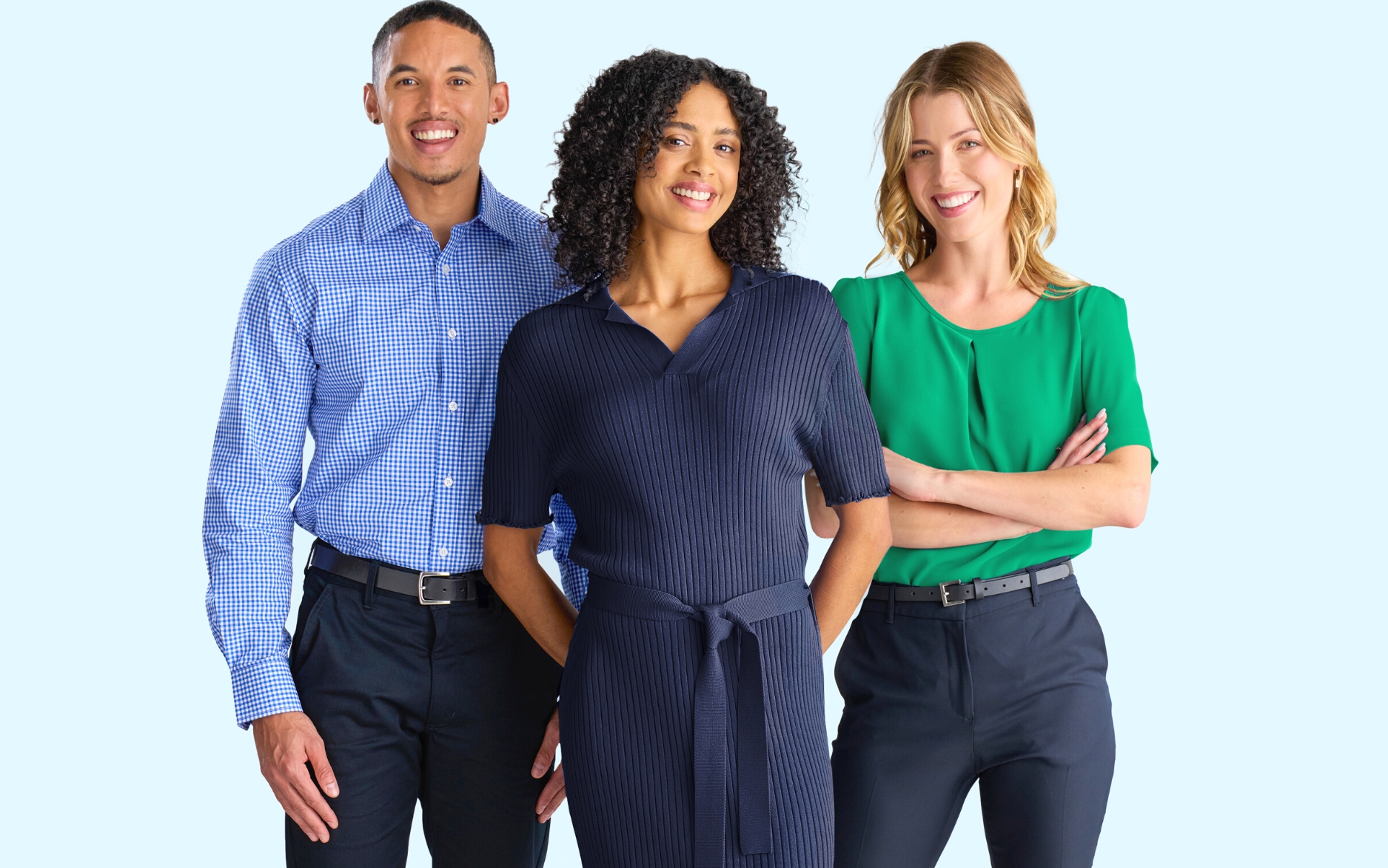 Healthcare Uniforms: A photo of two smiling women and one man wearing Designs To You healthcare uniforms.