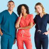 Three Veterinary Professionals Posing Together Wearing Vet Nurse Scrubs by Designs to You.