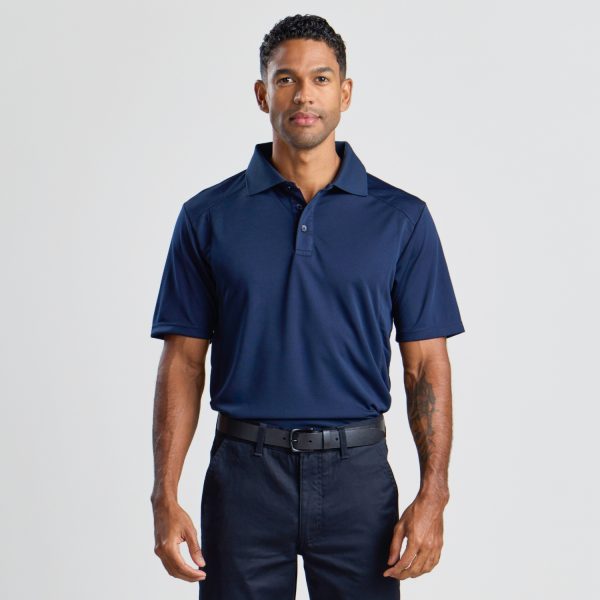 a Man Standing Face Forward, Wearing a Men's Eco Bamboo Polo in Navy with Short Sleeves and a Collar.
