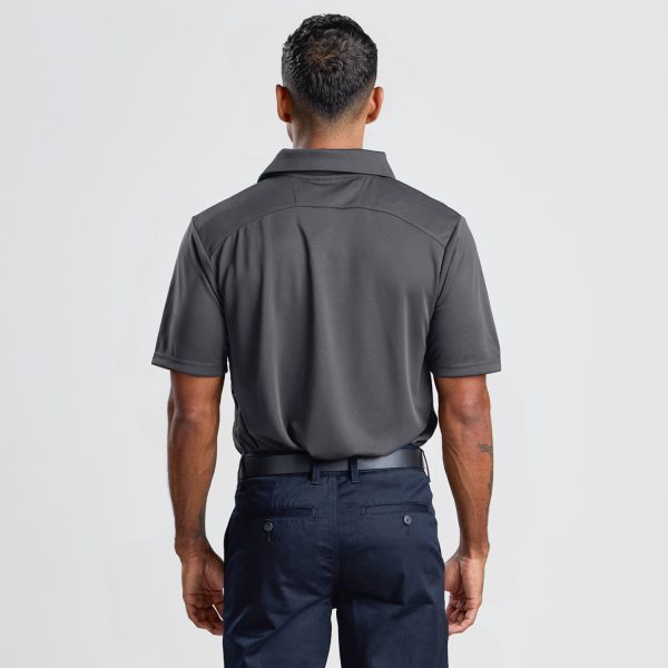 the Back View of a Man in a Men's Eco Bamboo Polo in Storm Grey, Emphasizing the Shirt’s Back and Collar.
