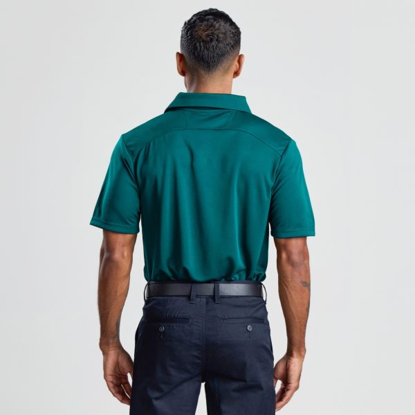 a Rear View of a Man in a Men's Eco Bamboo Polo in Teal, Showing the Clean Lines and Collar Design.