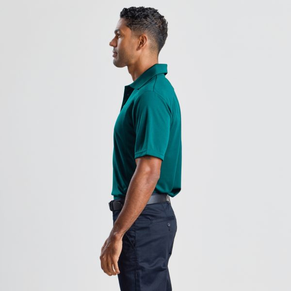 a Side View of a Man Wearing a Men's Eco Bamboo Polo in Teal, Detailing the Shirt's Tailored Fit and Sleeve Length.