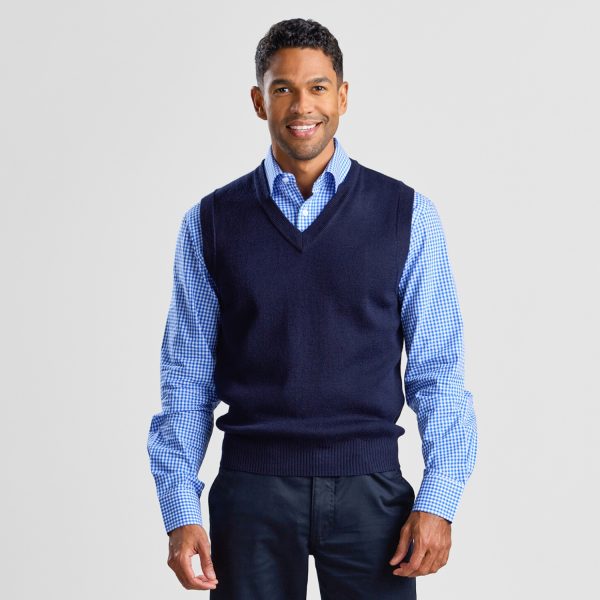 Front View of a Man in a Navy V-neck Pullover Vest Layered over a Blue and White Checkered Shirt.
